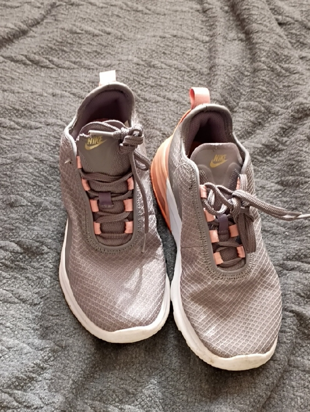 Nike Women’s Gray Athletic Sneakers with Pink Accents